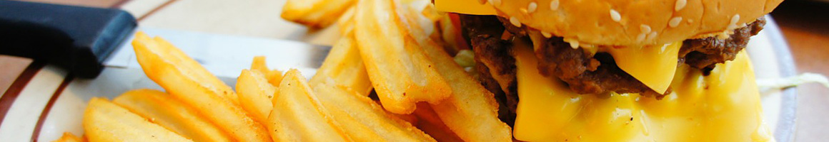 Eating American (Traditional) Burger at Jimmy's Big Burger Lake Worth restaurant in Lake Worth, TX.